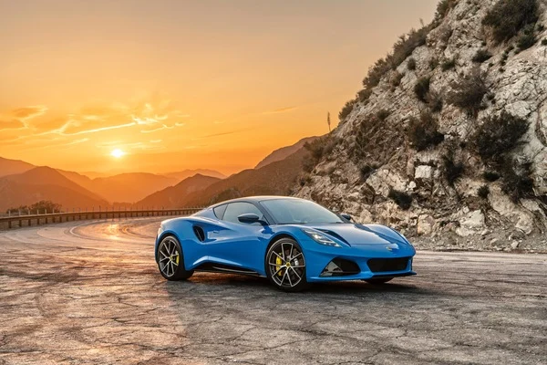 blue car at sunset